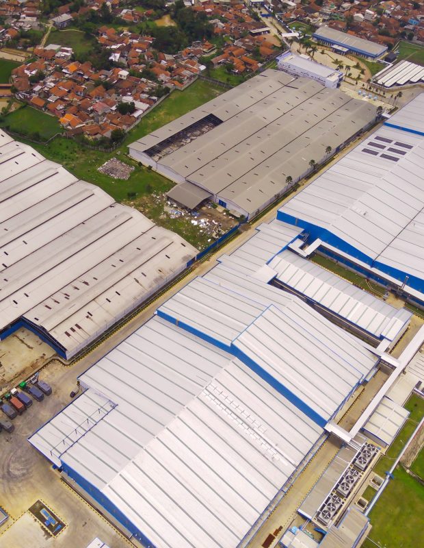 snack-factory-on-the-outskirts-of-town-aerial-view-of-factory-in-mountain-valley-bandung-indonesia-food-industry-above-aerial-landscapes-shot-from-a-drone Aerial View Stock photos by Vecteezy